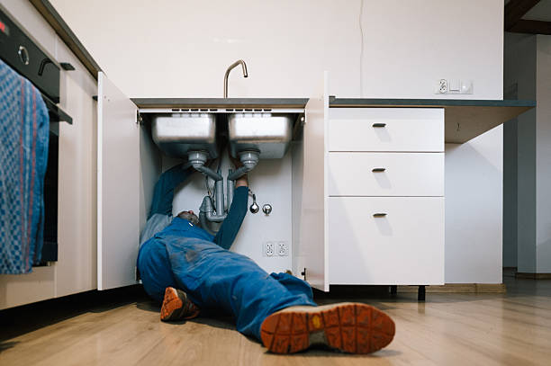 Professional Plumbing technician working in Scottsburg, IN